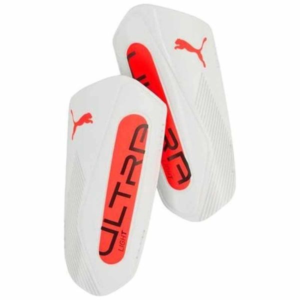 Puma Ultra Light Strap jalkapallosuoja, väri valkoinen ja oranssi Puma Ultra Light Strap jalkapallosuoja, väri valkoinen ja oranssi